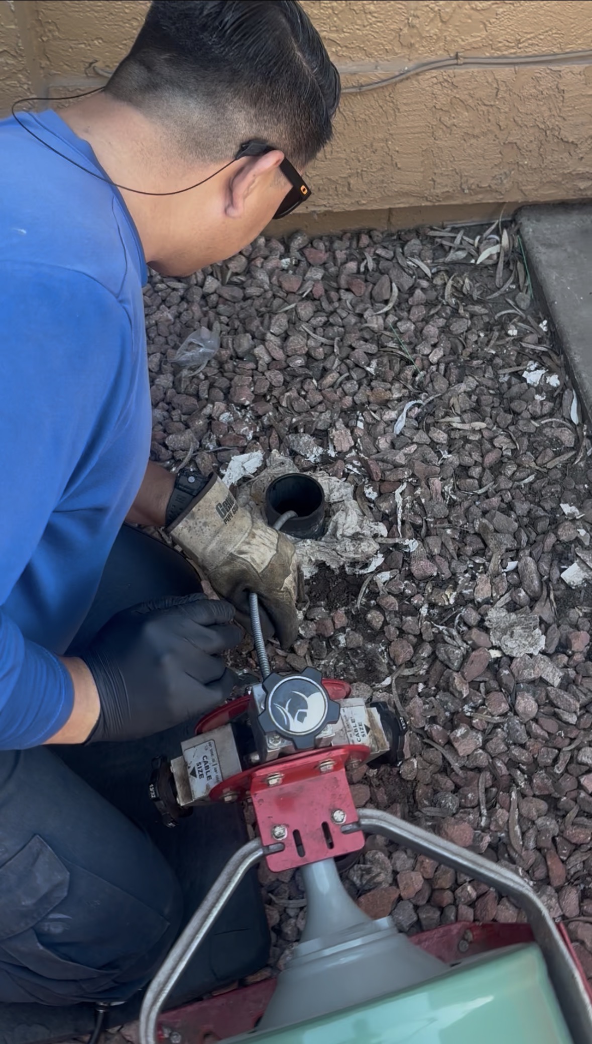 technician accessing sewer cleanout in Phoenix