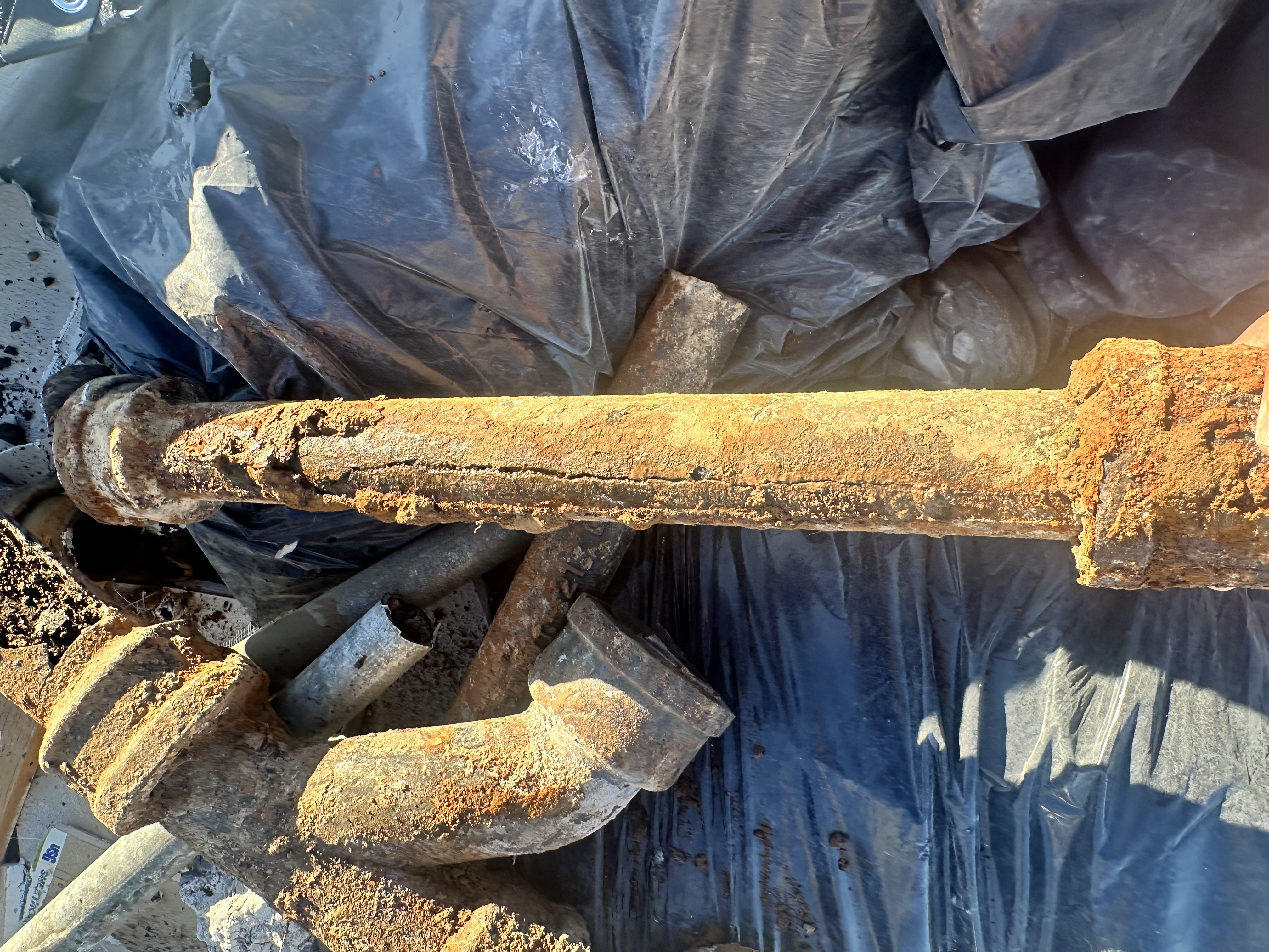 Failed cast iron sewer pipe Phoenix heavy corrosion and buildup