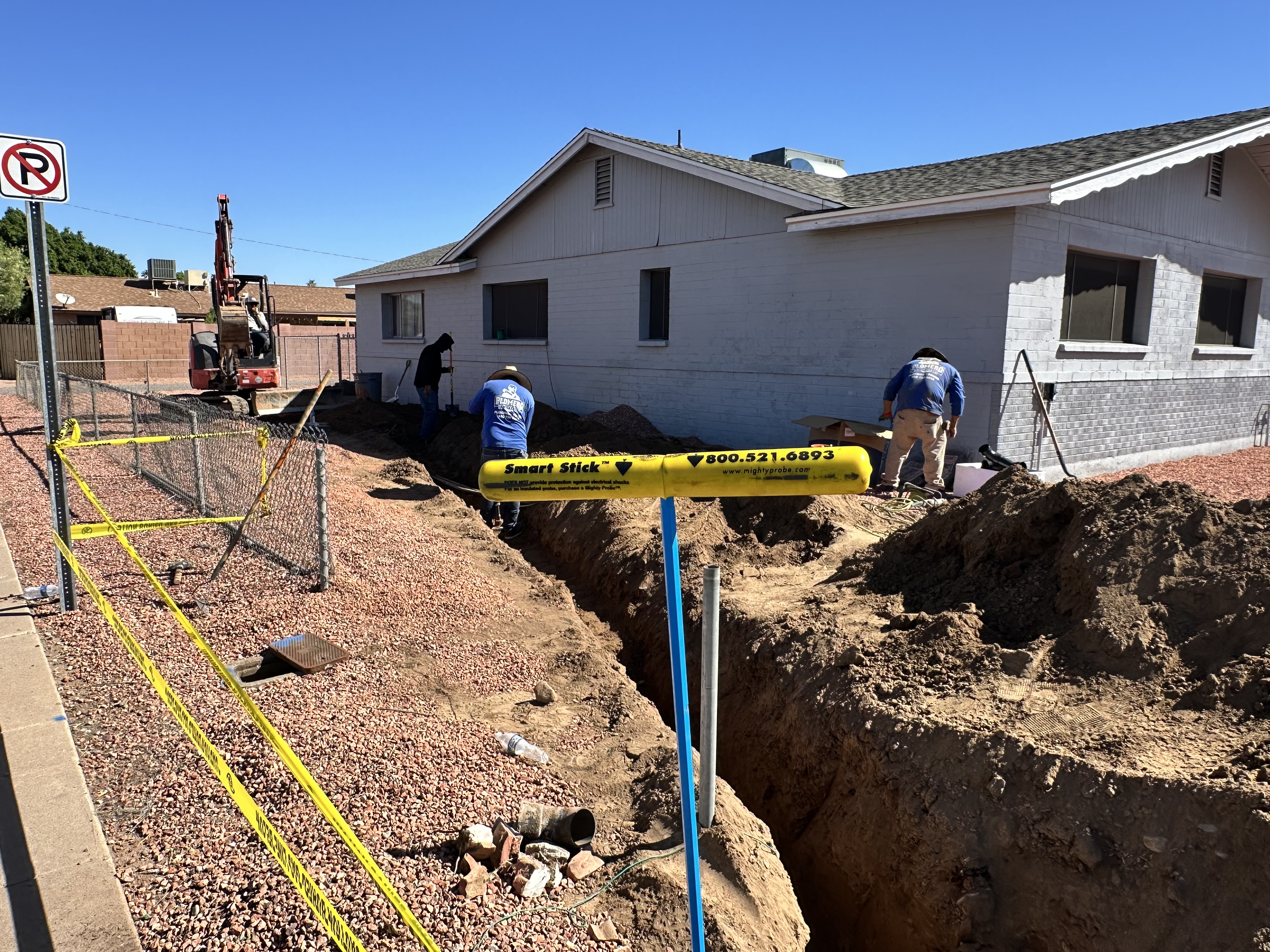 Whole house sewer replacement Phoenix trench excavation along property